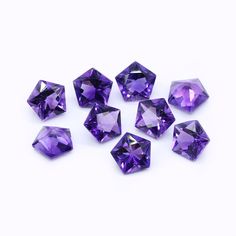 six purple diamonds on a white background