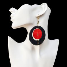 Elegance in Black: Timeless Appeal Embrace the allure of sophistication with these exquisite Black Earrings. Meticulously handcrafted and designed for timeless appeal, these earrings are a perfect blend of style and versatility. The jet-black hue exudes charm, making them a must-have accessory for any occasion. Elevate your look effortlessly with this chic and understated accessory. Passion in Red: Make a Statement Experience the vibrancy of passion with these stunning Red Earrings. The small round red part at the center creates a bold statement, capturing attention with its unique design. Perfect for those who dare to be different, these earrings infuse energy and charisma into your ensemble. Unleash your inner boldness and let your style speak volumes. Nature's Touch: Wooden Earrings Cra Dare To Be Different, Charm Making, Red Earrings, Black Earrings, Wooden Earrings, Earrings Collection, Earthy Tones, Jet Black, Fashion Sense