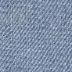 a blue jean fabric textured up with some small holes in the back ground,