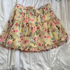 B Jewel Floral Mini Ruffle Skirt Size Small Cream With Blue And Pink Flowers Cream Colored Lining Elastic Waistline With Ruffle/Scrunched Fabric Shell: 100% Polyester Lining: 100% Polyester No Damage Never Worn Beach Floral Print Mini Skirt, Summer Floral Print Mini Skirt For Brunch, Floral Print Summer Mini Skirt For Brunch, Floral Print Mini Skirt For Summer Brunch, Summer Mini Skirt With Floral Print For Brunch, Feminine Floral Print Mini Skirt For Beach, Feminine Beach Mini Skirt With Floral Print, Beach Tiered Mini Skirt With Floral Print, Floral Print Tiered Mini Skirt For Beach