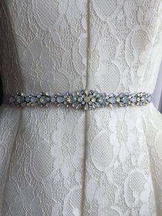 Ivory Crystal and Opal Jewel Embellished Ribbon Bridal | Etsy Elegant Blue Sashes For Wedding, White Rhinestone Bridal Belt For Evening, Evening White Bridal Belt With Rhinestones, Embellished White Bridal Belt For Ceremony, Embellished White Wedding Sashes, White Embellished Wedding Sash, White Embellished Bridal Belt For Ceremony, White Embellished Fitted Sash, Elegant White Sash For Mother Of The Bride