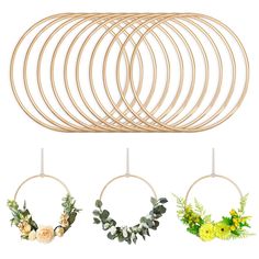 six wooden hoops with flowers and greenery hanging from the top, on a white background