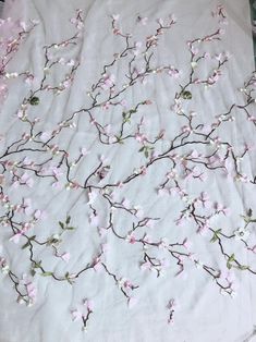 "Pink petals and brown branches embroidered on pink tulle, wear a dress made of it and you will look sweet and beautiful. Listing is for one yard. Measurement (approx): 53.1\" in width (135 cm) Qty: 1 yard ( Additional quantities are available.) DIY homemade fabric, Wedding, Bridal dress, Ribbon flowers, jewelry design, doll clothes, Cake, dolls, hang adorn, bra decoration, small parts, home decor... and so on, or any other crafts you like. Wholesale Acceptable ---------------------------------- Pink Organza Fabric With Floral Applique, Pink Tulle Fabric With Floral Embroidery, Spring Pink Embroidered Tulle Fabric, Pink Floral Embroidered Organza Fabric, Pink Organza Fabric With Floral Embroidery, Pink Organza With Floral Embroidery, Pink Flower Embroidered Fabric For Spring, Spring Embroidered Tulle Fabric, Pink Organza Tulle Fabric For Spring