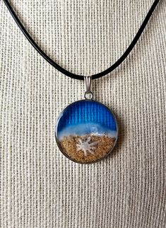 Beautiful handmade resin beach themed necklace, silver pendant Silver Necklace With Large Pendant For Beach, Handmade Ocean-inspired Round Pendant Jewelry, Handmade Ocean Colored Pendant Jewelry, Handmade Ocean Color Pendant Jewelry, Handmade Ocean Color Necklaces For Jewelry Making, Ocean-inspired Nickel-free Necklace With Round Pendant, Nickel Free Ocean-inspired Necklace With Round Pendant, Silver Round Beach Necklace, Silver Resin Pendant Jewelry