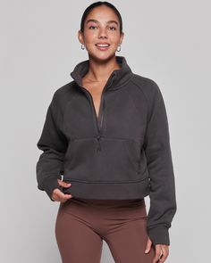 Unwind in style with our boxy half zip pullover silhouette. Itt's a loungewear game changer. Wear it to and from practice with your favorite pants. Made in our irresistibly soft fleece scuba fabric. Features a crop length that lands just below the waist, a funnel neck, pockets, and thumbholes. Machine Wash Model is 5'7" wearing size XS/S Half-zip Loungewear Tops, Relaxed Fit Fleece Half-zip Top, Relaxed Fit Half-zip Fleece Top, Fall Half-zip Relaxed Fit Top, Fall Relaxed Fit Half-zip Top, Fleece Half-zip Top, Cropped Half Zip, Half Zip Jacket, Scuba Fabric