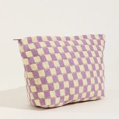 This checker makeup bag is a must-have for any fashion-forward individual. With its streamlined design and spacious interior, this bag is perfect for organizing your makeup and toiletries while on the go. The zip closure ensures your items stay secure, while the custom patch adds a unique touch. Stay on trend and organized with this preppy and trendy bag. Custom Patch, Small Travel Bag, Checker Design, Checkered Design, Toiletries Organization, Custom Patches, Yellow Plaid, Purple Bags, Plaid Fashion