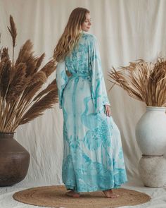 Appreciate the charm of this slow fashion, stunning maxi kaftan, with colors reminiscent of a summer breeze. Made from eco-friendly modals derived from Bamboo trees, this item ensures breathability and coziness. It adds a touch of class to any occasion, pairing perfectly with your favorite leggings or jeans, or even as a chic robe over your sensual underwear. This piece is an ideal blend of comfort and style, suitable for various moments and moods. Size: Our model is wearing size M and has the f Bamboo Trees, Favorite Leggings, Maxi Kaftan, Kaftan Maxi Dress, Garment Steamer, Short Kimono, Summer Breeze, Eco Fashion, Winter 2024