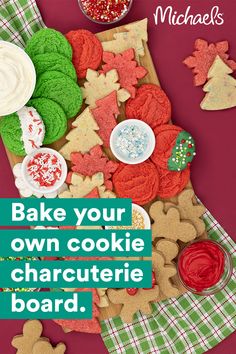 cookies are arranged on a board with the words bake your own cookie character board