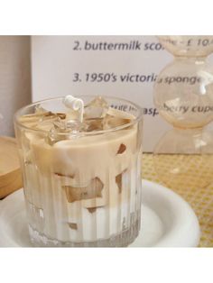 an ice cream dessert in a glass on a plate