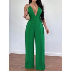 Unleash Your Inner Diva With This Striking Green Backless Jumpsuit. Designed For A Sexy And Sophisticated Look, It Features A Spaghetti Strap Neckline And A High Waistline That Highlights Your Curves. The Backless Design, Knot Detail, And Zipper Add A Touch Of Allure, Making This Jumpsuit Perfect For Making A Bold Statement. Crafted From Woven Fabric, This Long, Sleeveless Jumpsuit Offers A Loose Fit With A Non-Stretch Finish For A Relaxed, Flowing Silhouette. Practical Pockets And An Unlined Bo Fitted Green Halter Neck Jumpsuit, Elegant Green Beach Jumpsuits And Rompers, Elegant Green Jumpsuits And Rompers For Beach, Spring Evening Jumpsuits And Rompers With Spaghetti Straps, Spring Evening Jumpsuit With Spaghetti Straps, Green Fitted Spaghetti Strap Jumpsuit, Green Fitted Jumpsuit With Spaghetti Straps, Fitted Green Jumpsuit With Spaghetti Straps, Green Fitted Backless Jumpsuits And Rompers