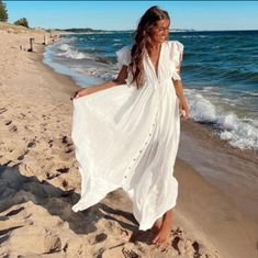 White Button-up Maxi Dress For Vacation, Bohemian Beach Maxi Dress With Buttons, Bohemian Buttoned Maxi Dress For Beach, Summer Beach Maxi Dress With Buttons, Chic Beach Maxi Dress With Button-up, Chic Button-up Maxi Dress For Beach, White Button-up Maxi Dress For Summer, Button-up Beach Dresses With Buttons, Bohemian Maxi Dress With Buttons For Vacation