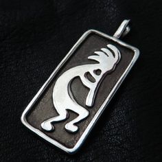 Kokopelli is a Native American fertility deity, usually depicted as a dancing flute player. Kokopelli's flute-playing chases away the winter to bring the spring. Many tribes associate Kokopelli with the rains and agriculture/harvest. He is also a trickster god and represents the spirit of music. Made of sterling (925) silver. The pendant is 1.7cm (0.66 inch) wide and 4.3cm (1.69 inch) high. The pendant's loop is 3mm (0.11 inch) wide. A leather cord is included with the pendant. Silver Smithing, Flute Player, Jewelry Pottery, Rock Hounding, Leather Cord, Fertility, Sterling Silver Chains, The Ordinary, Agriculture