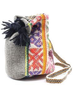 These charming bags are made of repurposed vintage hand woven textiles from the villages of the Sacred Valley in Cusco, Peru. Each features a drawstring to keep your treasures secure and a shoulder strap for carrying close. They are lined with soft black material. Great for holding special medicine pieces or use it as a change purse. Each one is unique & beautiful; let us pick one for you! Woven Hobo Shoulder Bag For Travel, Handwoven Multicolor Crochet Travel Bag, Multicolor Woven Crochet Travel Bag, Multicolor Crochet Bag With Weaving For Travel, Multicolor Crochet Weaving Bag For Travel, Multicolor Crochet Weaving Travel Bag, Travel Hobo Shoulder Bag With Woven Details, Weaved Bucket Bag For Market, Multicolor Woven Bucket Bag As Gift