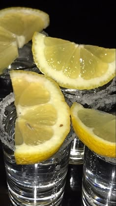 lemons and water in glasses with ice