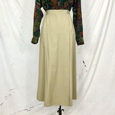 Khaki cotton gaucho pants with overlapping skirt panels and side zip closure.  Best fits: S Measurements:  Waist: 27," Hips: 34," Length: 36," Inseam: 24.75," Rise: 13.5" Condition:  Excellent vintage condition Shop notes: All vintage items have a past, as such they may have minor imperfections. I do my best to mend anything major and call out what cannot be fixed. All major flaws or repairs are listed in the garment condition.  All garment measurements are taken flat. I suggest you compare the measurements to a similar garment you own rather than using your body measurements as it will give you a more accurate idea of fit. Please note that most garments are pinned to fit the mannequin, I try my best to make everything look as it would on the wearer but sometimes the item may appear more " Safari Skirt, Gaucho Pants, Womens Skirts, Secret Pants, Small Waist, Body Measurements, Side Zip, Favorite Outfit, Womens Skirt