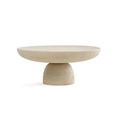 a white table with a round base on it's side, against a white background