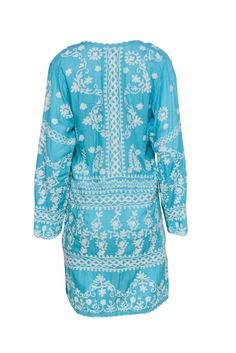 Go bright and bohemian with this funky frock from Melissa Odabash! Made in a vibrant sky blue hue with chic embroidery throughout, this easy and breezy beauty is perfect for throwing on after a day at the beach! Pair with strappy sandals and a straw bag and you'll be all set for dinner by the sea or a stroll on the boardwalk. Size S 100% Rayon Pullover Unlined Shift silhouette V-neckline Long sleeve All-over embroidered design Lace trim on neckline and hem Bust 40" Waist 37" Sleeve length 21" Sh Blue V-neck Dress With Resham Embroidery, Light Blue Embroidered Beach Dress, Blue Embroidered Dress With Resham Embroidery For Spring, Light Blue Floral Embroidery Dress For Vacation, Light Blue Long Sleeve Dress With Floral Embroidery, Light Blue Floral Embroidered Dress For Vacation, Light Blue Chikankari Embroidery Dress, Light Blue Embroidered Summer Dress, Traditional Light Blue Spring Dress