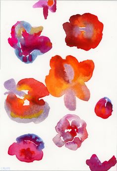 watercolor flowers on white paper with red and orange colors