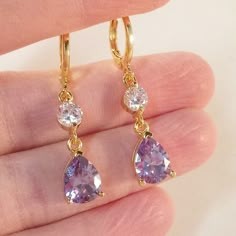 Earrings Beautiful Women's Classic Elegant Design Amethyst Purple Dangle Earrings 18k Yellow Gold Filled With Large Sparkling Pear Teardrop Water Drop Shape Amethyst Purple + Smaller Clear White Round Simulated Diamond Topaz Zircon Gemstones. Top Quality, High Polished Shine, Brand New, Never Been Worn. Lead, Nickel Free. These Earrings Sparkle. Perfect Jewelry For Any Day, Special Occasion Gift Anniversary Banquet Dating Birthday Promise Prom Dance Holiday Party Christmas Stocking For Yourself Purple Prom Earrings, Dangly Purple Earrings, Gold Purple Jewelry, Jewelry For Purple Dress, Purple And Gold Earrings, Gold And Purple Jewelry, Purple And Gold Jewelry, Light Purple Jewelry, Tangled Wedding