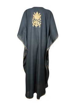 For a effortlessly elegant and beautifully bohemian look, add Woman Caftan Dress Black Floral Embroidered Maxi Dresses to your wardrobe. This must-have piece is designed for both comfort and style, draping gracefully over the body to create a relaxed yet sophisticated silhouette. The intricate floral embroidery adds a touch of artisanal charm, making it stand out for any occasion. It also makes for a wonderful gift, and is perfect for a destination beach wedding, a dreamy rehearsal dinner, or a Black Kaftan For Beach And Eid, Embroidered Tunic Abaya For Vacation, Traditional Black Kaftan For Vacation, Traditional Black Dress For Vacation, Traditional Black Free Size Dress, Black Beach Dress For Eid, Black Tunic Kaftan For Festive Occasions, Traditional Tunic Abaya For Beach, Black Festive Kaftan For Festivals