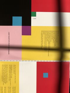 an image of a book with different colors and text on the front cover that is folded in half