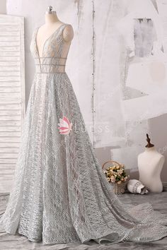 Sleeveless Shimmer Evening Dress For Wedding, Sparkling V-neck Evening Dress For Wedding, Sparkling Backless Evening Dress For Wedding, Silver Backless Evening Dress, Sparkling Backless Evening Dress, Elegant V-neck Gown For Pageants, Glamorous Shimmer Evening Dress For Wedding, Glamorous Silver V-neck Gown, Silver Ball Gown For Wedding And Prom Season