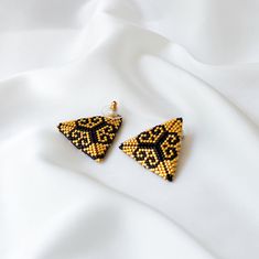 Gold Beaded Earrings With Black Beads For Party, Black Earrings With Gold Beads As Gift, Gold Drop Earrings With Black Beads, Gold Beaded Earrings With Black Beads As Gift, Traditional Gold Earrings With Tiny Beads, Traditional Gold Beaded Earrings With Tiny Beads, Gold Festive Earrings With Tiny Beads, Festive Gold Earrings With Tiny Beads, Gift Black Beaded Earrings With Gold Beads