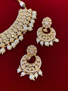 High gold plated designer Tyaani Kundan set with matching Chandbali. Next to real anti tarnish platting, hypoallergenic. Suitable for anything . Can be worn as a necklace or choker. About 1.5 inch wide on the neck. Earring is 2 inch long , push back and very very light weight . Intricate Design Bridal Choker For Festivals, Festival Bridal Necklace With Intricate Design Choker, Kundan Choker Necklace With Intricate Design For Celebration, Intricate Design Kundan Choker Necklace For Celebration, Ceremonial Chandbali Choker With Intricate Design, Intricate Choker Jewelry Sets For Celebration, Celebration Intricate Choker Jewelry Sets, Traditional Jewelry Sets With Intricate Design Choker, Ceremonial Chandbali Choker For Festivals