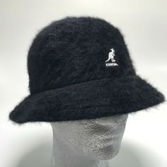 Material: 45% Angora 35% Modacrylic 20% Nylon Wide Brim Black Bucket Hat For Winter, Black Brimmed Bucket Hat For Winter, Black Flat Brim Bucket Hat For Winter, Winter Black Flat Brim Bucket Hat, Classic Black Brimmed Bucket Hat, Casual Black Bucket Hat For Winter, Casual Black Winter Bucket Hat, Kangol Hat, Kangol Hats