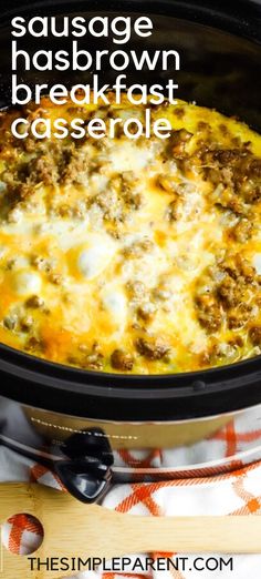 sausage hashbrown breakfast casserole in the crock pot with text overlay