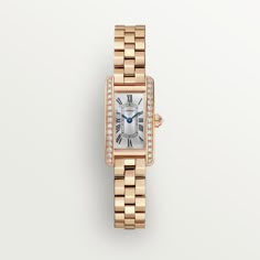 Cartier - Tank Américaine watch - Watch Gold - Tank Américaine watch, mini model, quartz movement. 18K rose gold (750/1000) case and faceted crown set with 31 brilliant-cut diamonds totaling 0.55 carats. Silvered sunray dial, blued-steel sword-shaped hands, sapphire crystal. 18K rose gold (750/1000) bracelet. Triple clasp in rose gold 750/1000. Case dimensions: 28 mm x 15.2 mm, thickness: 6.5 mm. Water-resistant up to 3 bar (approx. 30 meters/100 feet). Cartier Tank Americaine, Trinity Bracelet, Trinity Necklace, Cartier Earrings, Cartier Necklace, Tank Watch, Trinity Ring, Mini Model, Cartier Tank