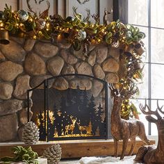 a living room decorated for christmas with deers and pine cones on the mantel