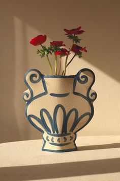 a vase that has some flowers in it