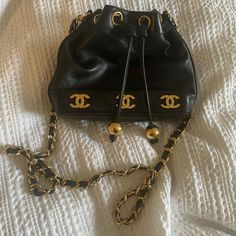 Excellent Condition, Rare, Lambskin Leather With 24k Plated Gold. Designer Gold Bucket Bag For Everyday Use, Designer Gold Bucket Bag With Dust Bag, Designer Gold Bucket Shoulder Bag, Luxury Evening Bag With Chain Strap In Bucket Shape, Designer Gold Bucket Bag With Detachable Handle, High-end Gold Pouch Shoulder Bag, Luxury Bucket Evening Bag With Chain Strap, Designer Gold Bucket Bag For Travel, Vintage Shoulder Bag For Everyday Luxury