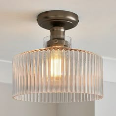 a close up of a light fixture in a room