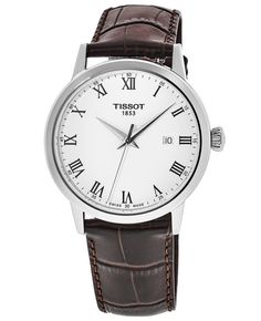 Brand New Authentic Tissot Classic Dream White Dial Leather Strap Men's Watch Model T129.410.16.013.00. Stainless Steel case with Brown Alligator Leather strap. Tang clasp. Fixed bezel. Dial description: Silver-tone Hands and Roman Numeral Hour markers with Minute markers around the outer rim and the Date displayed at 3 o'clock on a White dial. Quartz movement. Powered by Tissot Caliber ETA F06.115 engine. Watch functions: Date, Hour, Minute, Second. Scratch Resistant Sapphire crystal. Round cas Tissot Watches, Mens Fashion Watches, Roman Numeral, 3 O Clock, Watch Model, White Dial, Men's Watch, Sapphire Crystal, O Clock