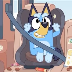 a cartoon character sitting in a car seat