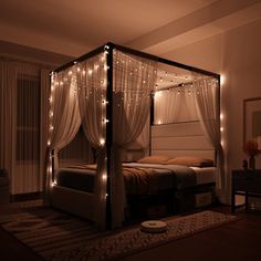 a canopy bed with lights on it in a bedroom