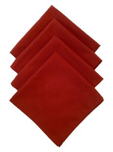 six red napkins folded on top of each other