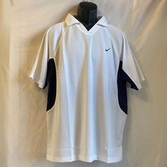 Nike Dri Fit White/Blue Polo Style Shirt Size Xxl Embroidered Nike Emblem On Left Side 100% Polyester New With Tag Nike Cotton Collared Tops, Nike Cotton Short Sleeve Polo Shirt, White Fitted V-neck Polo Shirt, Nike Classic Collared Tops, Classic Nike Collared Tops, Classic Collared Nike Tops, Relaxed Fit Collared Sports Top, Nike Casual Short Sleeve Polo Shirt, Nike Casual Collared Tops