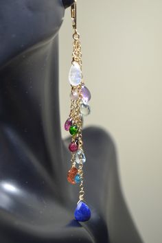 "These Earrings are a beautiful composition of Stunning Gemstones that are presented to You in a \"Rainbow\" of Colors: It will bring a smile to your recipient's face and it sure to go with any outfit! Each Earring features 14 Unique Gemstones in a variety of shapes and sizes. This gives the earrings lots of character and each gemstone is individually hand wired for a more bohemian look and feel. >Rainbow, Rainbow Statement Earrings, Chain Drop Earrings, Gemstone Earrings, Duster Earrings, Lo Fine Jewelry Multi-stone Drop Earrings, Elegant Multi-stone Long Drop Jewelry, Elegant Long Drop Multi-stone Jewelry, Elegant Multi-stone Drop Jewelry, Multi-stone Dangle Earrings For Party, Party Jewelry With Gemstones In 14k Gold, Party Jewelry In 14k Gold With Gemstones, 14k Gold Gemstone Jewelry For Parties, Party 14k Gold Gemstone Jewelry