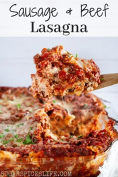 sausage and beef lasagna in a casserole dish