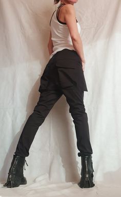 "Extravagant Women Skinny Pants, Outer Pockets Pants ❤️ Extravagant designs and high quality fabrics! ❤️ Materials & Care Textile, Cotton Polyester Hand wash at low temperatures. Do not machine dry. Do not iron. Do not dry clean! ❤️ Sizing We can make your piece from XS to 5XL! Everything in the shop can be also made according to your measures free of charge! ❤️ Shipping ✈ Ready to ship The time I need to prepare an order for shipping varies. For details, see individual items. Priority shipp Black Bottoms With Belt Loops For Cosplay, Alternative Style Black Stretch Bottoms, Alternative Style Stretch Black Bottoms, Alternative Black Stretch Bottoms, Punk Full-length Bottoms With Pockets, Baggy Punk Bottoms With Pockets, Black Gothic Pants For Alternative Fashion, Punk Style Stretch Bottoms For Cosplay, Fitted Punk Cargo Pants For Streetwear