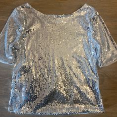 Nwot Silver Sequins Short Sleeved Shirt. Does Not Have A Tag With Size . When I Ordered It Was Under Med/Lg. Bought It For A Diamonds And Disco Party. Beautiful For Any Occasion. Perfect For New Years Wishlist 2024, Silver Shorts, Sequin Shorts, Disco Party, Birthday Wishlist, Silver Sequin, Silver Diamonds, Short Sleeve Shirt, Sleeve Shirt