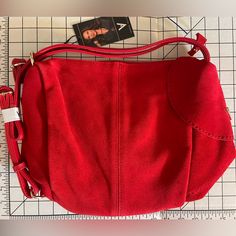 Nwt New With Tags Red Suede Sling Backpack / Handbag/ Purse By Vanessa Williams, Gold Hardware, Includes Black Storage Pouch. About 12” Wide And 10” Tall. Has A Cel Phone Pocket On The Outside, As Pictured. Inside The Purse It Has 2 Cell Phone Size Pockets As Well As A Zipper Pocket. Two Adjustable Straps For Wearing Like A Backpack. Excellent Brand New Condition, Never Used. Genuine Suede. Christmas, Valentine’s Day, Sexy, Red Leather. Chic Red School Bag, Red Satchel With Zipper Closure For School, Casual Red Crossbody Satchel, Red Shoulder Bag With Detachable Strap For School, Red School Shoulder Bag With Detachable Strap, Casual Red Hobo Bag With Satchel Shape, Casual Red Hobo Bag Shaped As Satchel, Trendy Red Pouch Satchel, Casual Red Satchel Hobo Bag