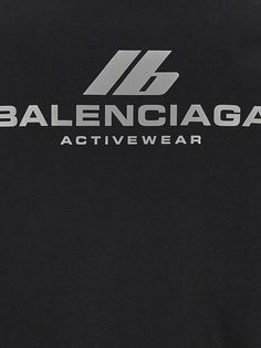 Balenciaga's hoodie crafted in black stretch cotton jersey with reflective logo print at chest / at back. It features front zip closure, kangaroo pockets, long sleeves, ribbed edges and straight hem.Gender: WOMENMaterial: T COTTON 92%;T ELASTAN 8%;R VISCOSE 85%Color: BlackMade in: ITProduct ID: 788243TQVV11000*Import tax/duty will be calculated at checkout (If applicable) Balenciaga Sweatshirt, Balenciaga Sweater, Balenciaga Hoodie, Valentino Garavani Bag, Clothing Board, Balenciaga Logo, Versace Shop, Circle Logo, Personalized Accessories