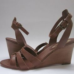 $348 Msrp Elie Tahari Natalia Strappy Leather Upper Adjustable Buckle Closure At Ankle Strap Leather Lining Leather Insole Stacked Wedge Leather Sole Heel Height: 3 14 In Size: 11 Medium Color: Nutmeg Elegant Beach Wedge Sandals With Stacked Heel, Elegant Brown Open Toe Wedge Sandals, Elegant Brown Wedge Sandals With Heel Loop, Brown Wedge Sandals With Removable Insole, Formal Wedge Sandals With Cushioned Footbed, Brown Wedge Heel Sandals For Formal Occasions, Leather Wedge Sandals With Heel Strap, Formal Leather Wedge Sandals With Cushioned Footbed, Brown Wedge Sandals With Removable Insole For Formal Occasions