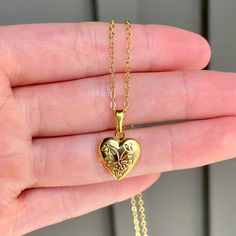 This necklace is 16" long and features a little heart shaped locket pendant. All materials are 24k gold plated and tarnish resistant. Valentine's Day Nickel-free Pendant Locket Necklace, Nickel-free Open Heart Locket Necklace For Valentine's Day, Heart Locket Necklace For Valentine's Day, Valentine's Day Heart Locket Necklace With Charm, Valentine's Day Gift Locket Necklace For Mom, Valentine's Day Heart Pendant Locket Necklace Nickel Free, Heart Pendant Locket Charm Necklace As Gift, Nickel Free Heart Pendant Locket Necklace For Keepsake, Heart Locket Charm Necklace Gift