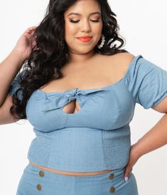 Fresh femininity, dames! This sultry plus size top from Unique Vintage is crafted in a sturdy woven fabric that radiates rockabilly vibes in chambray blue. The Turner Top boasts a self tie bow for added retro flair while the stunning off the shoulder and Bardot sleeves lends eye-catching detail to your posing. Outfitted with a smocked back and elastic cuffs for a flattering fit!Available in sizes XS-5X while supplies last. Sweetheart Top Outfit, Plus Size Crop Top Outfit, Sweetheart Top, Vintage Plus Size, Outfit Plus Size, Top Outfit, Tie Bow, Plus Size Top, Woven Top