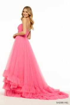 Sherri Hill 55982 Tulle A-line gown with keyhole, rosette embellishment, and a tiered ruffle skirt hem. Sherri Hill Prom, Mermaid Evening Gown, Princess Sleeves, Trumpet Dress, Sherri Hill Prom Dresses, Tiered Ruffle Skirt, Halter Gown, Ruffled Skirt, Ruched Top